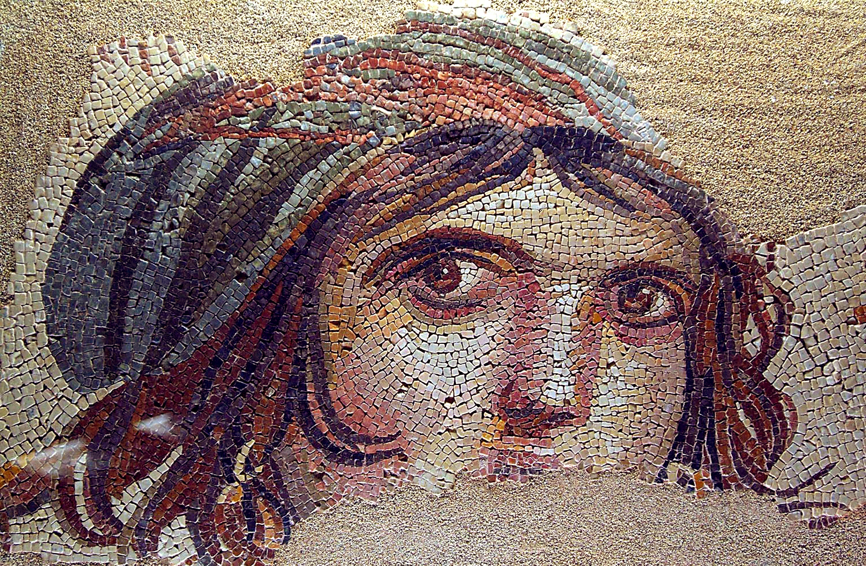 Roman mosaic of a gypsy girl, 2nd century CE?, Gaziantep Zeugma, Turkey. Source: James Gordon, released underCC BY via worldhistory.org.