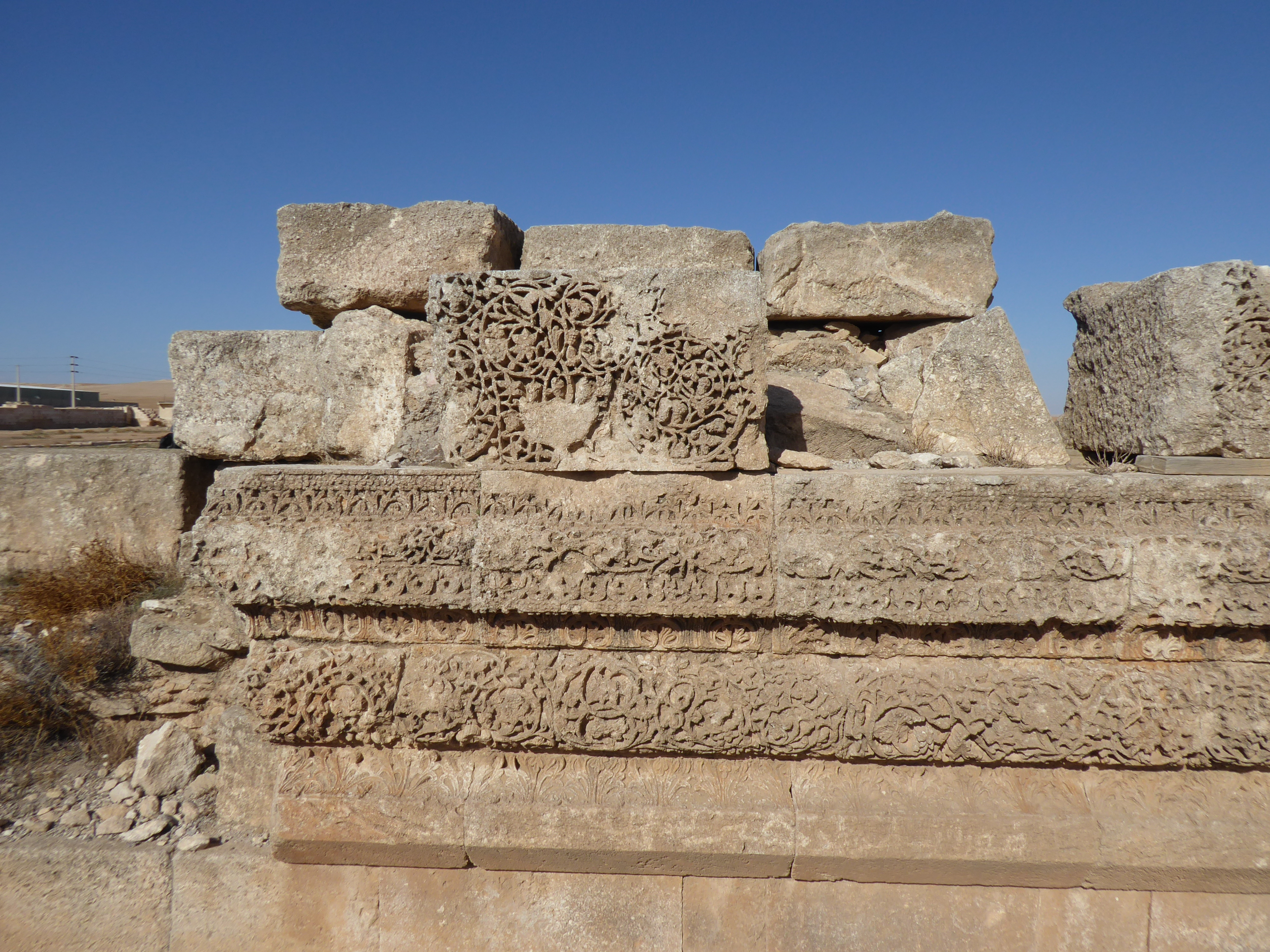 Cover image caption: A segment of the remaining frieze on the facade of the Mshatta Palace near Amman, Jordan, dated to the 740s and ascribed to the Caliph Walid II (743-44). Photo Nasser Rabbat.
